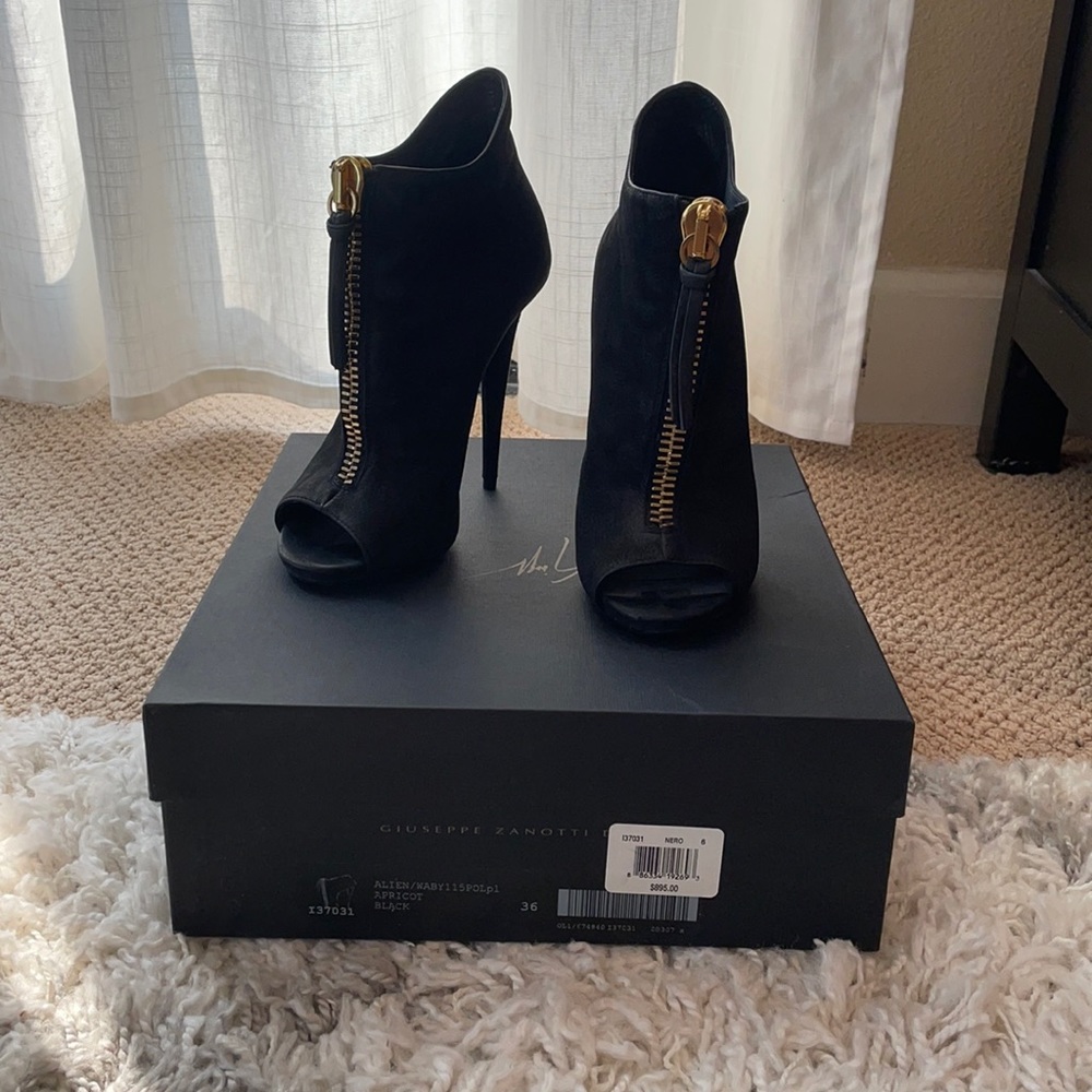 Giuseppe Zanotti. Black suede booties with gold zipper